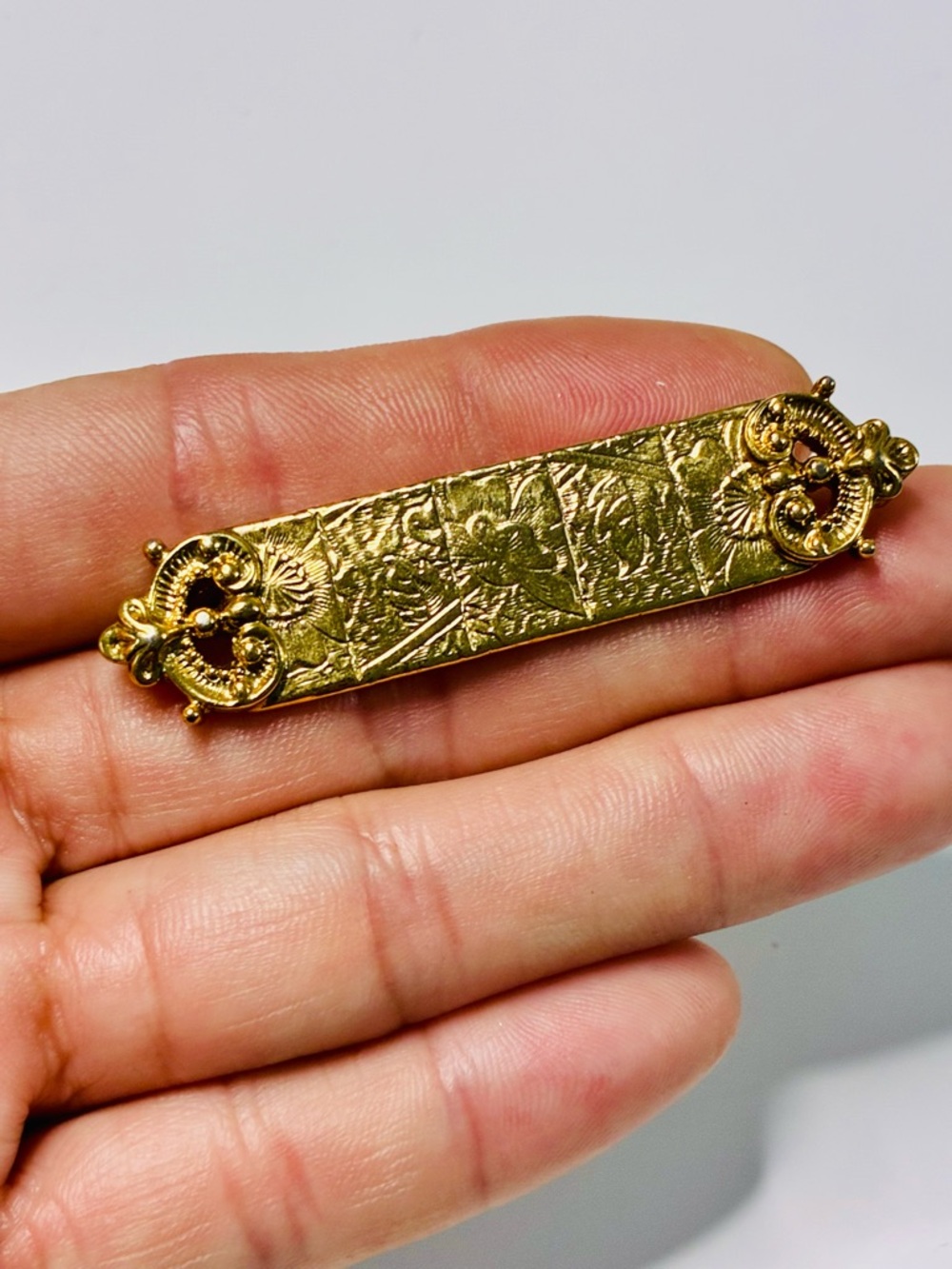 1928 Gold-Tone Floral Engraved Bar Brooch